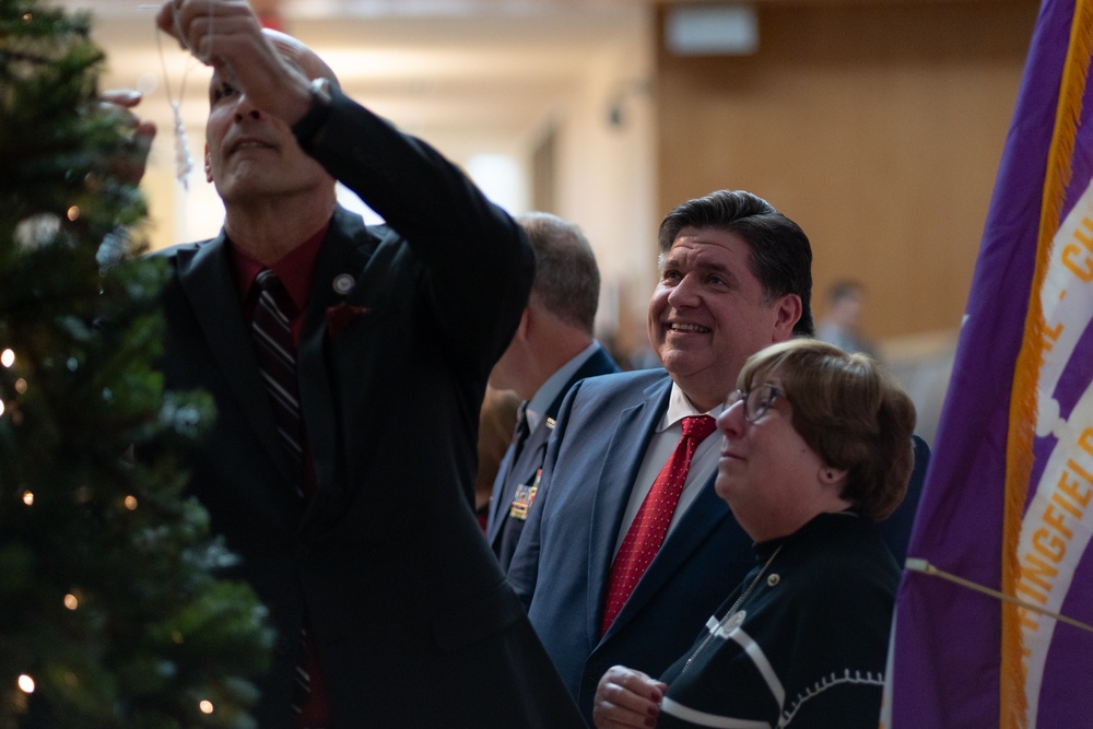Illinois National Guard Gold Star families place commemorative ornaments during a remembrance ceremo