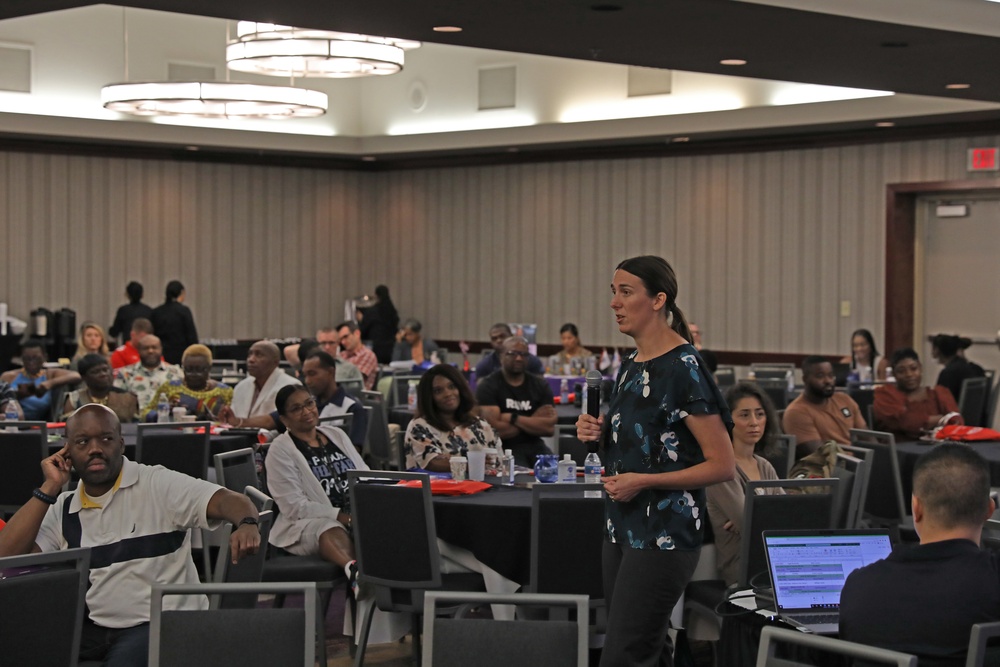 A personal financial counselor briefs National Guard Soldiers on available benefits at a Yellow Ribbon reintegration event.