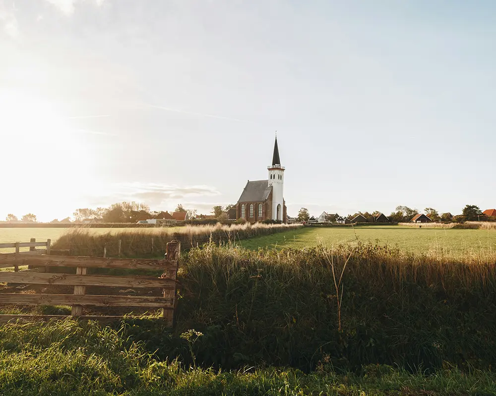 church on a grassy country field
