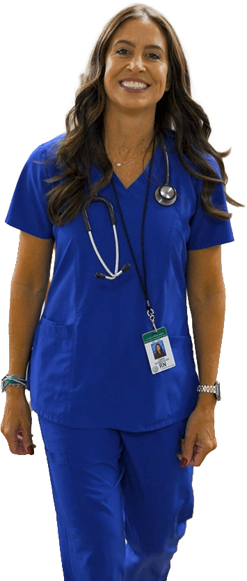 Tara Dorrough, smiling female nurse in blue scrubs with stethoscope and ID badge walking forward.