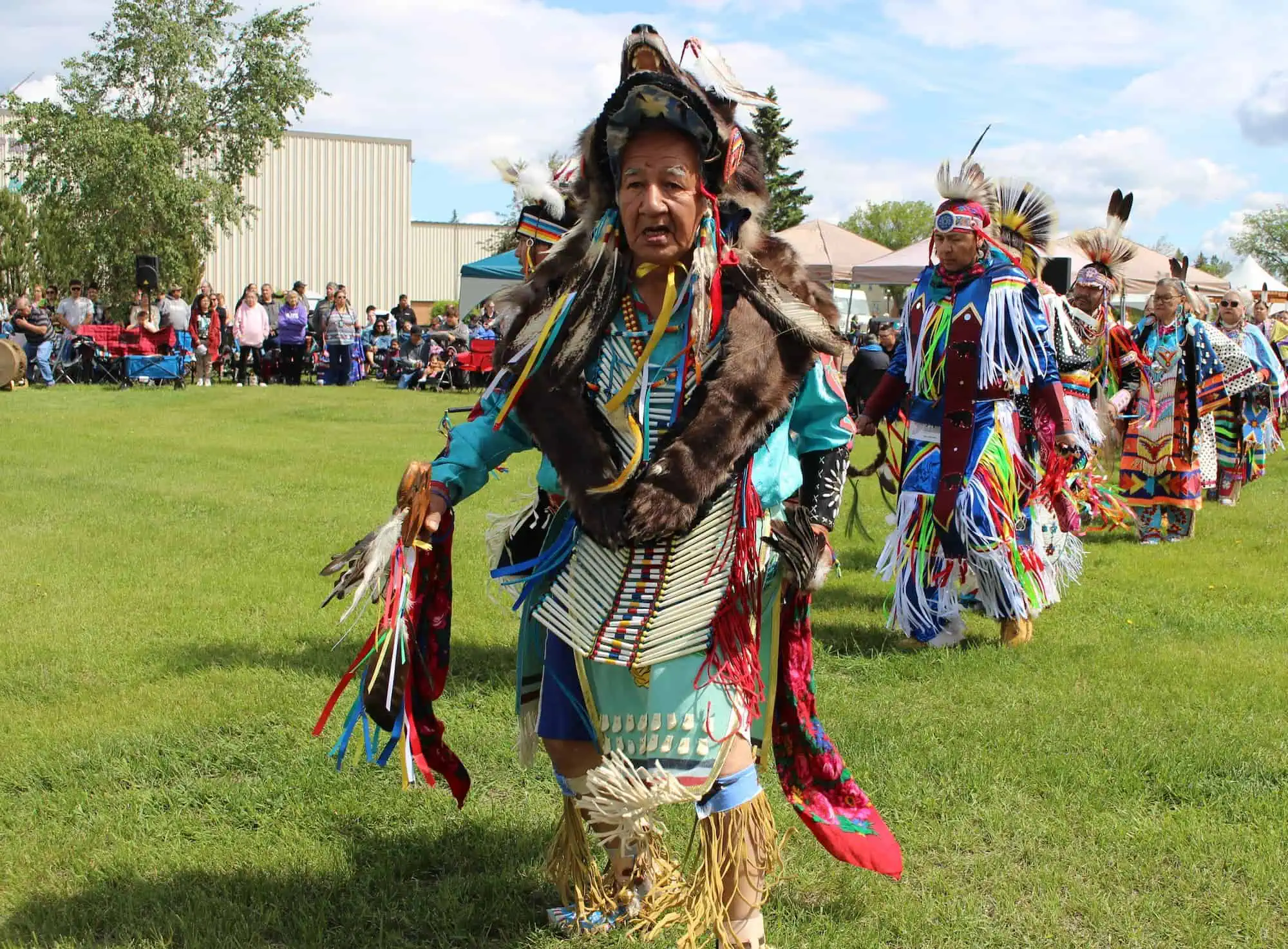 elders dancing at outdoor community event