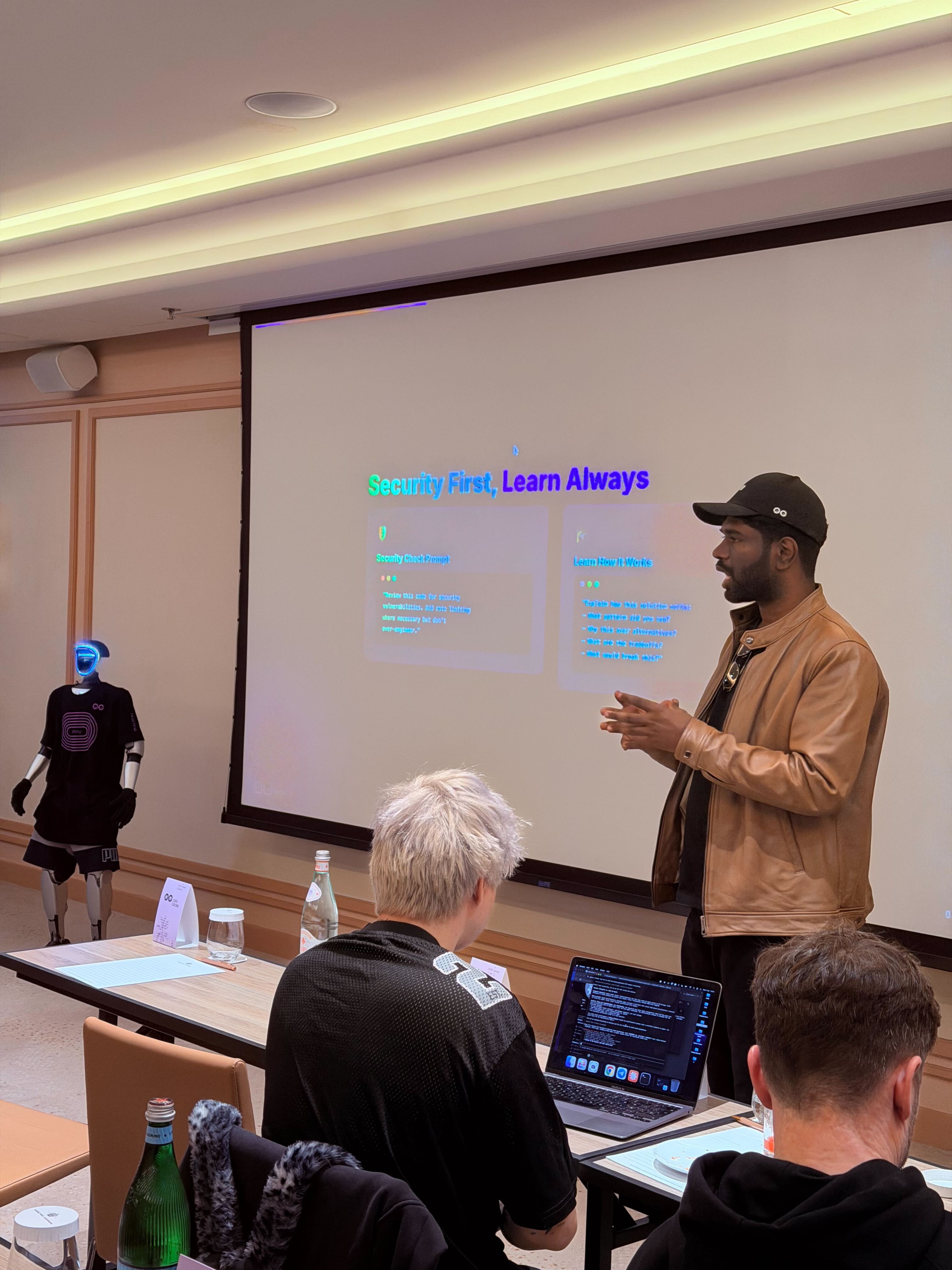 OpenClaw Meetup working session at Dev's Villa with Security First slide and 0G mascot