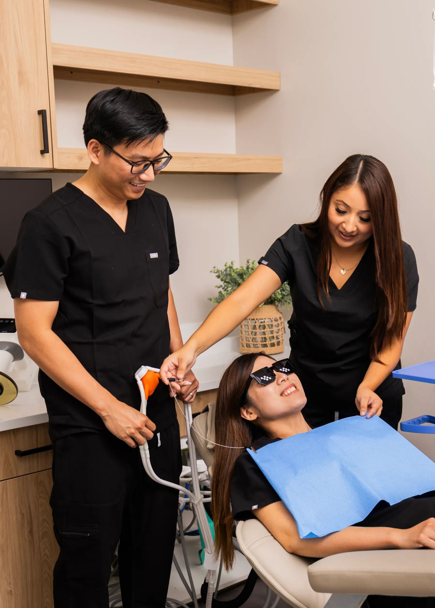 Dr. Huynh and team member checking patient