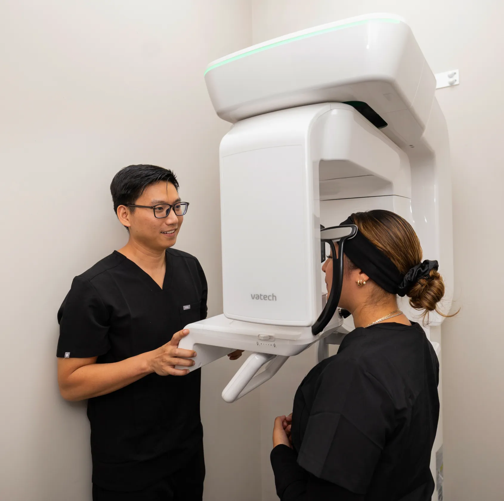 Dr. Huynh taking patient's x-rays