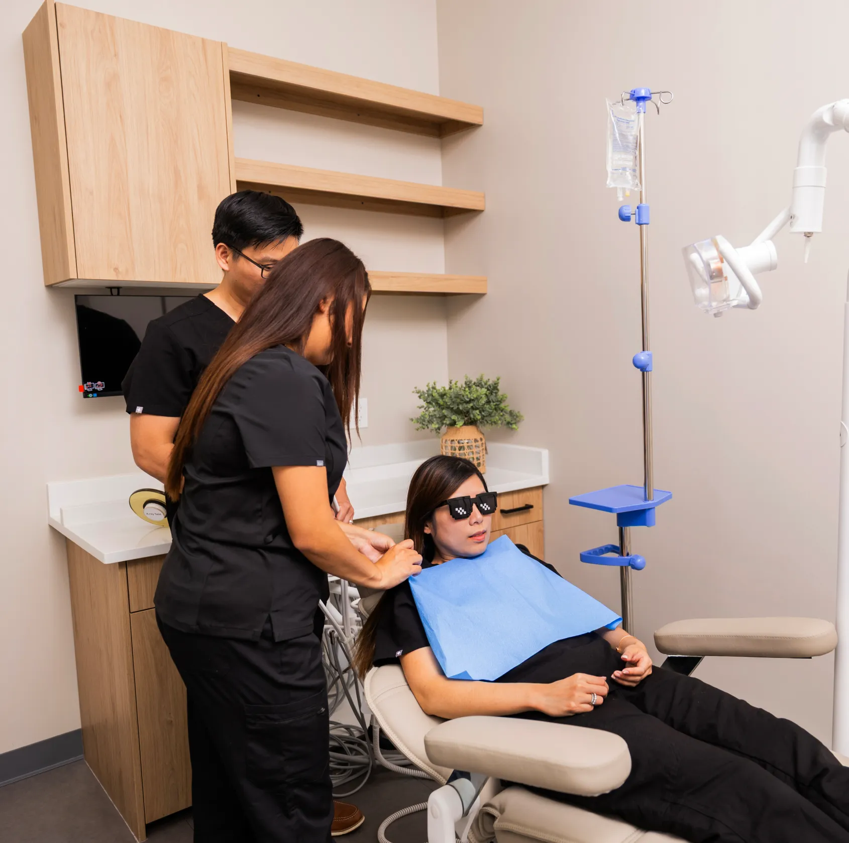 Dr. Huynh adjusting patient's sedation mask