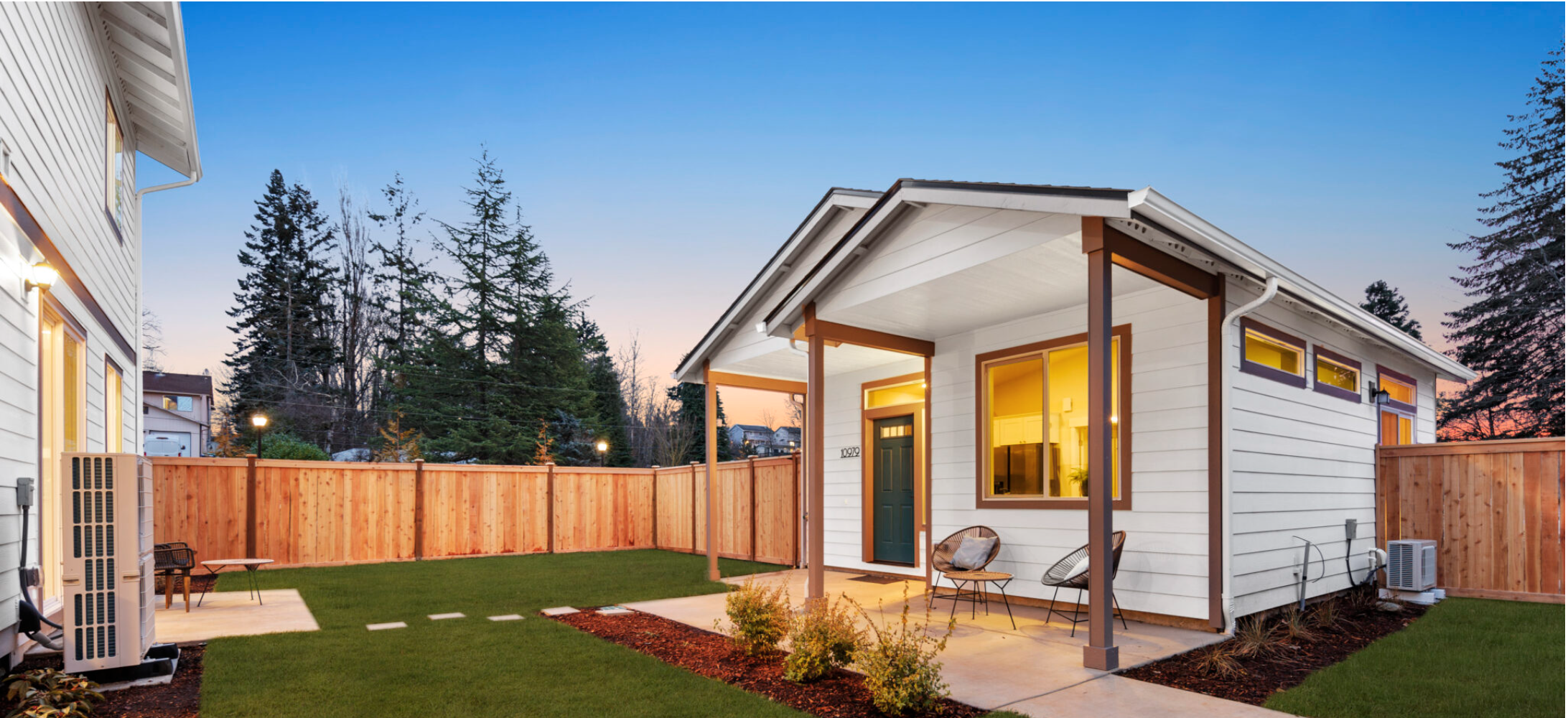 Detached ADU with black siding and clerestory windows