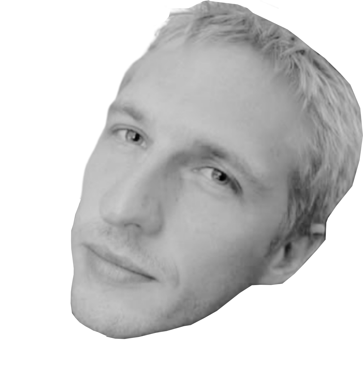 A headshot of Oliver Scott