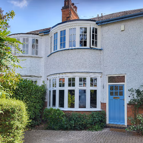 sash windows in white cottage