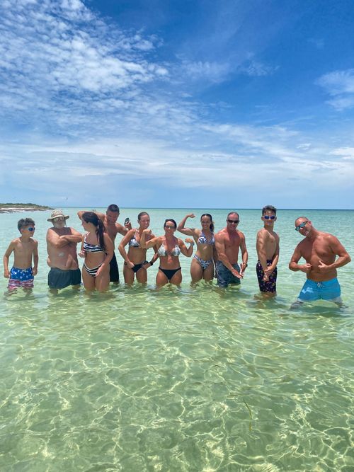 Group of friends relaxing on Clearwater Beach
