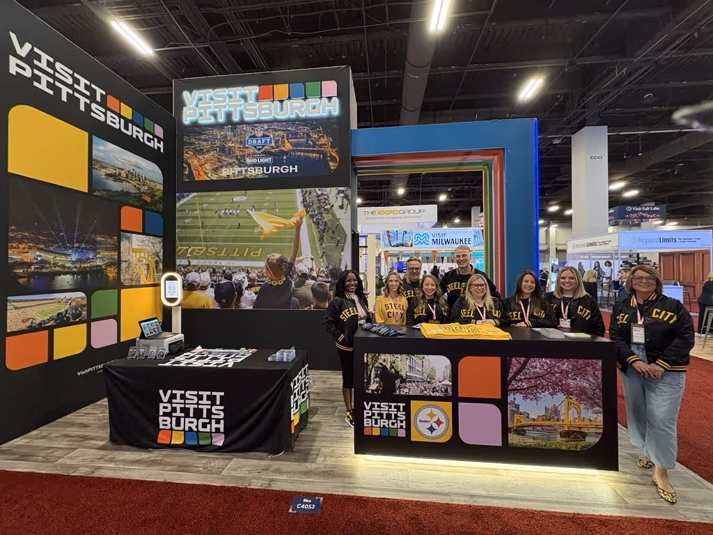 Custom AI Trading Card activation for Visit Pittsburgh booth at IMEX America Las Vegas USA