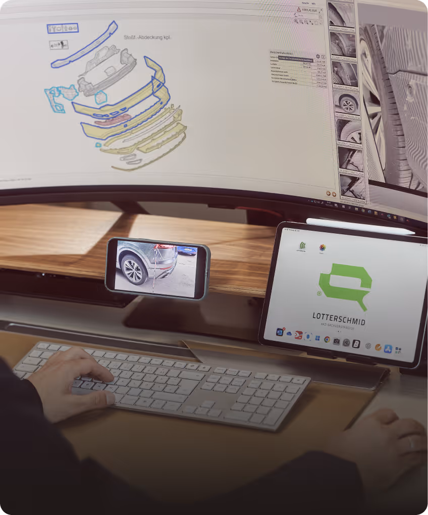 Arbeitsplatz eines KFZ-Sachverständigen mit Kalkulation eines Kaskoschadens und digitaler Dokumentation am Monitor.