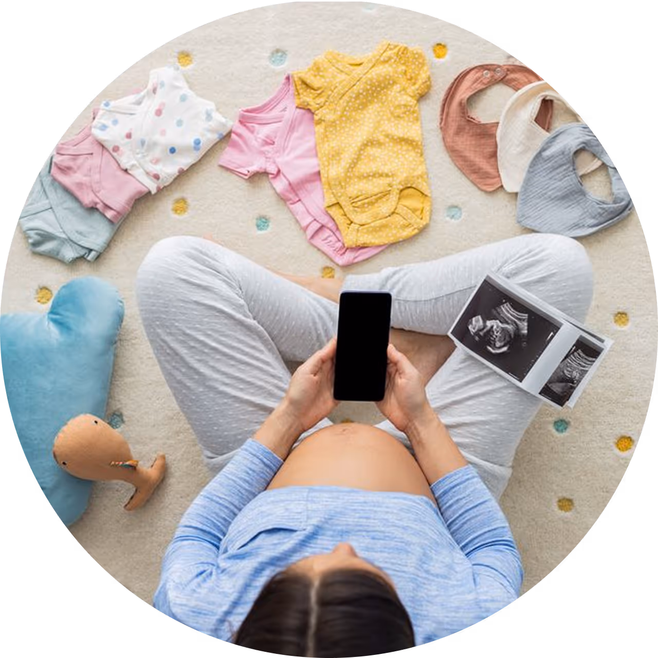 baby products including onesie, pacifier, bottle