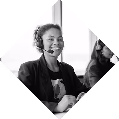 Smiling woman with headset smiling at the camera