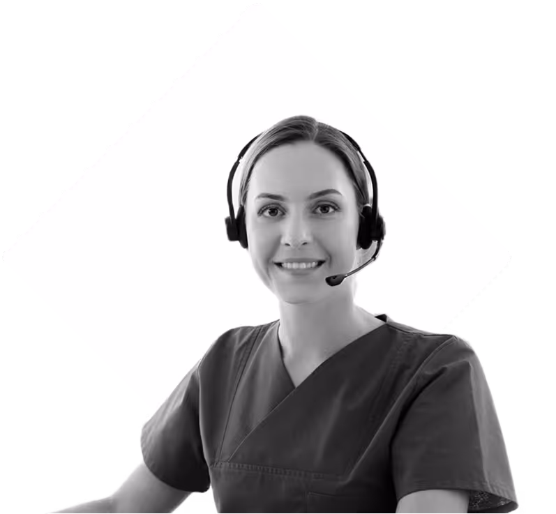 Healthcare administrator smiling with a call headset