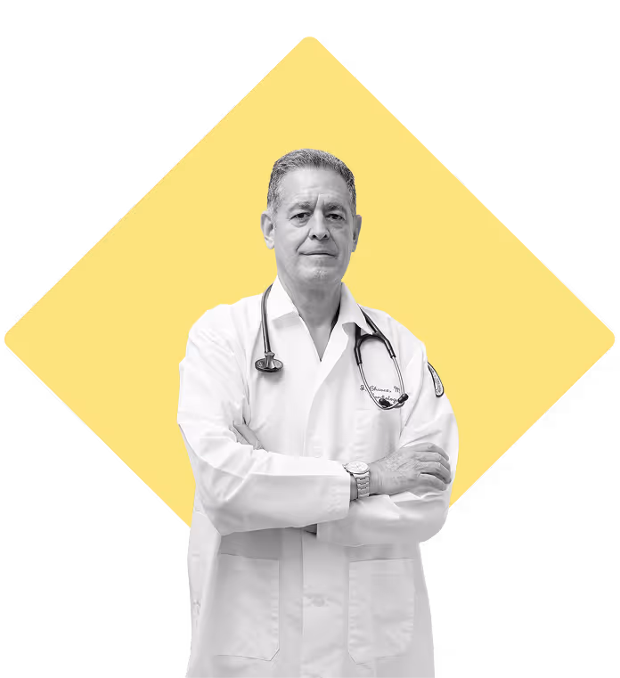 Doctor posing with his arms crossed