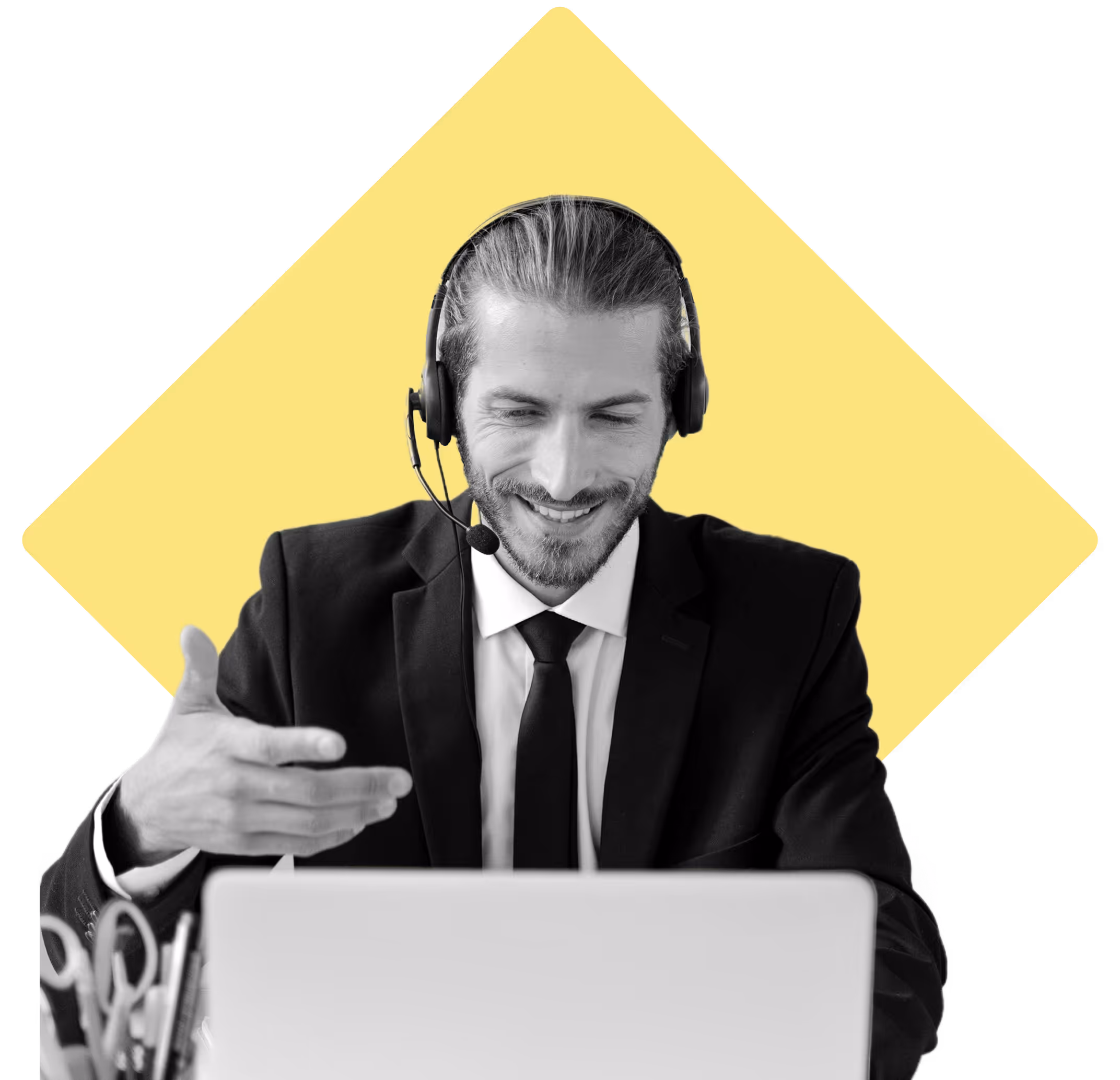 Business man on a Microsoft Teams meeting, on his laptop, with a headset on.