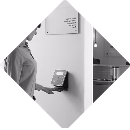 Woman entering a room via a security code console