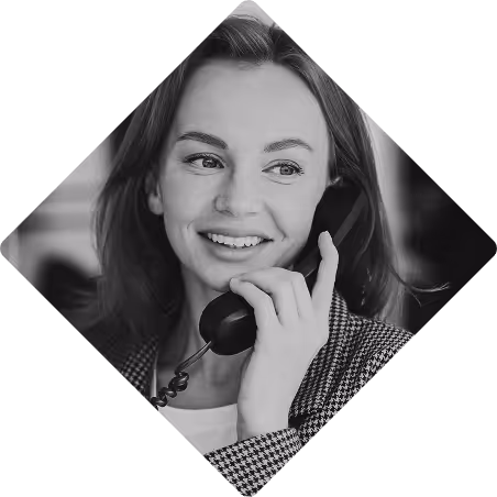 Woman smiling while taking a business call