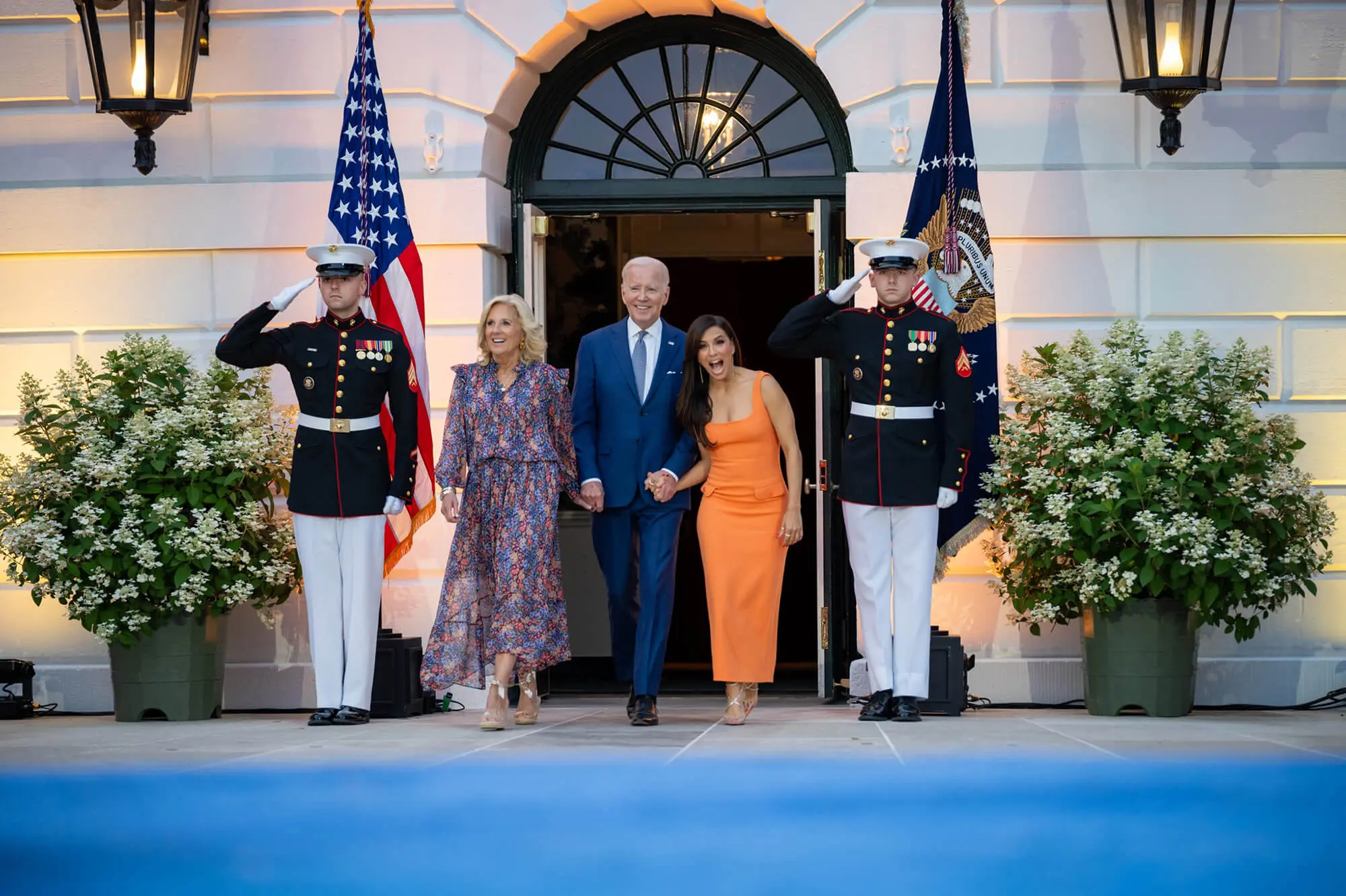 Eva Longoria beaming as she walks out with President Joe Biden and First Lady Jill Biden at a formal White House event