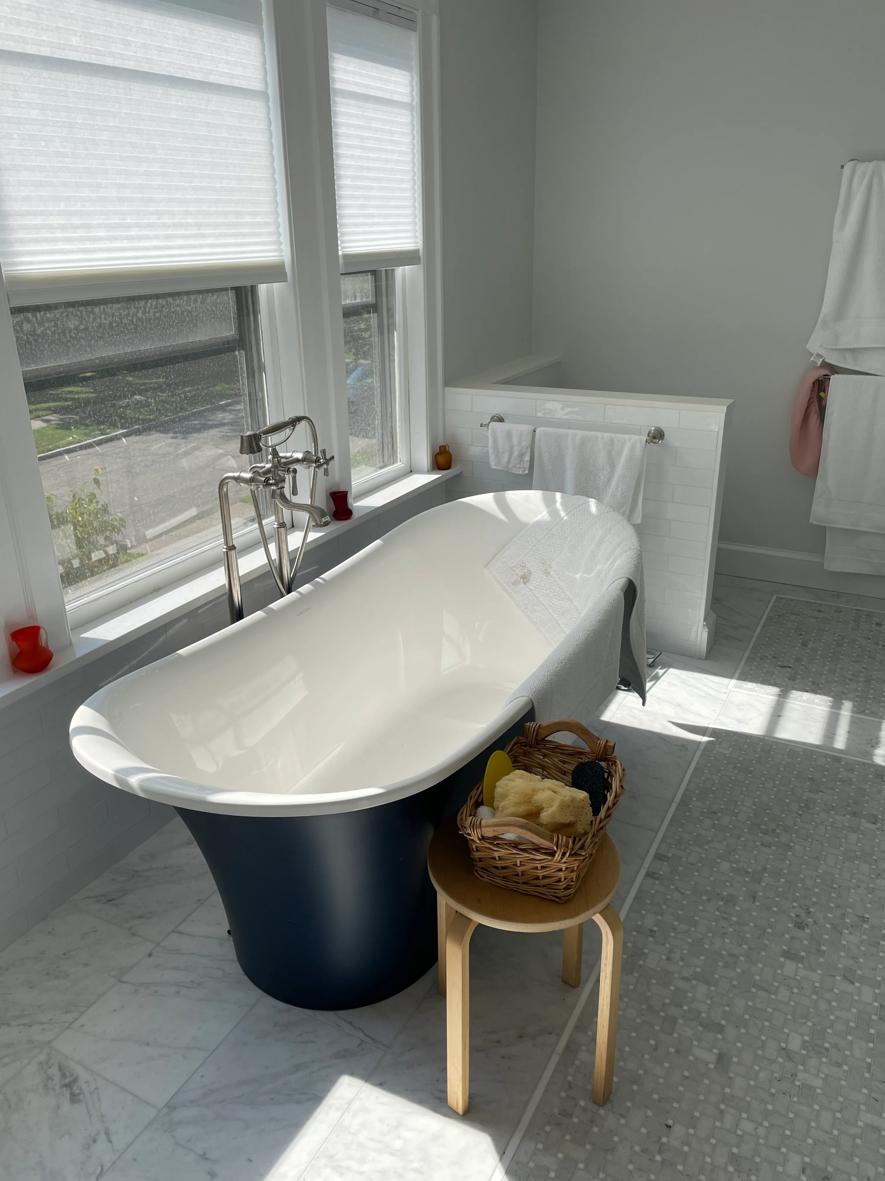Modern bathroom remodel with walk-in glass shower in Essex County, MA.