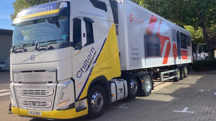 A lorry is parked at 45 degrees to the camera. The tractor unit (front) is Chiltern Distribution-branded, while the trailer is Sunswap branded, with the refrigeration unit just about visible between the two (attached to the front of the trailer).