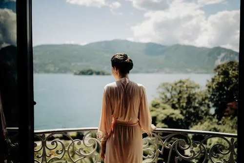 IWE - Italy Wedding Escapes - Villa Rusconi Clerici - A Bride looking at the Lake Maggiore
