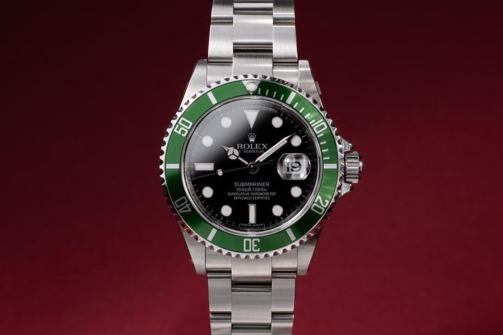NOS 2007 Rolex Green Submariner 16610LV with Papers
