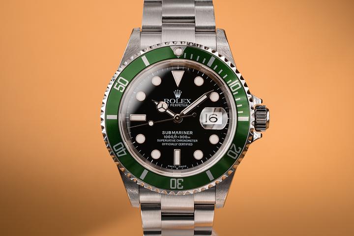 2004 Rolex Anniversary Submariner 16610 with Box and Papers