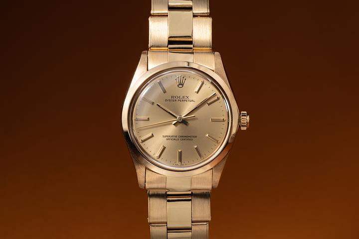 1977 Rolex 18K YG Oyster Perpetual 1002 Champagne Dial with Stretch Rivet Band