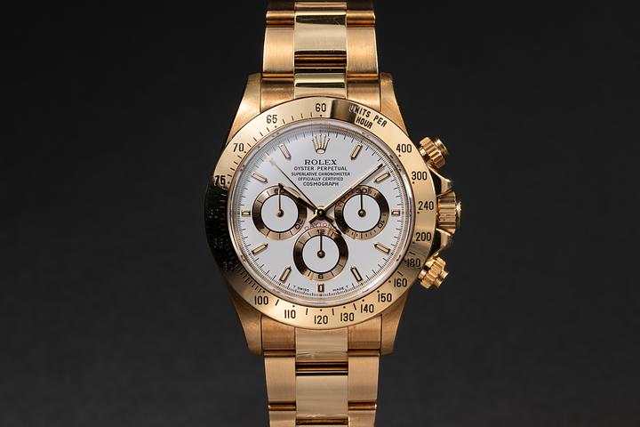 1997 Rolex 18k YG Daytona 16528 White Dial