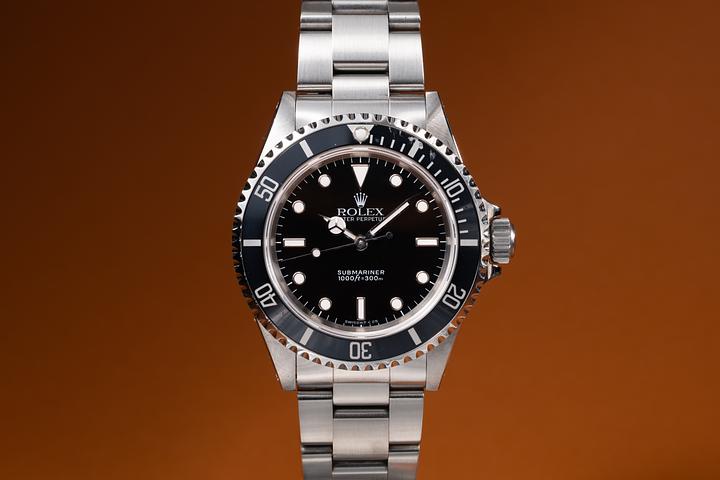 1995 Rolex Submariner 14060 with Papers & Service Papers