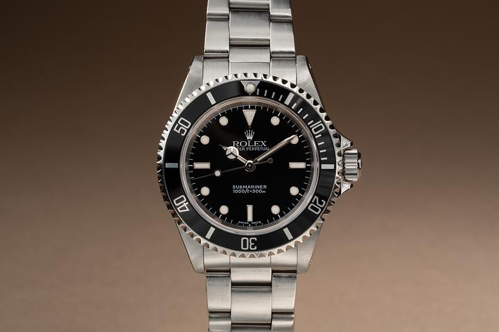 2004 Rolex Submariner 14060M with Papers & Service Card