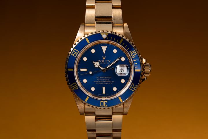 2005 Rolex 18K YG Submariner 16618 Blue Dial and Chinese Date Disk