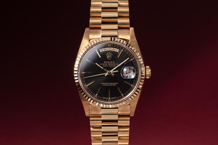 NOS 1994 Rolex 18K YG Day-Date 18238 Black Dial with Box & Papers