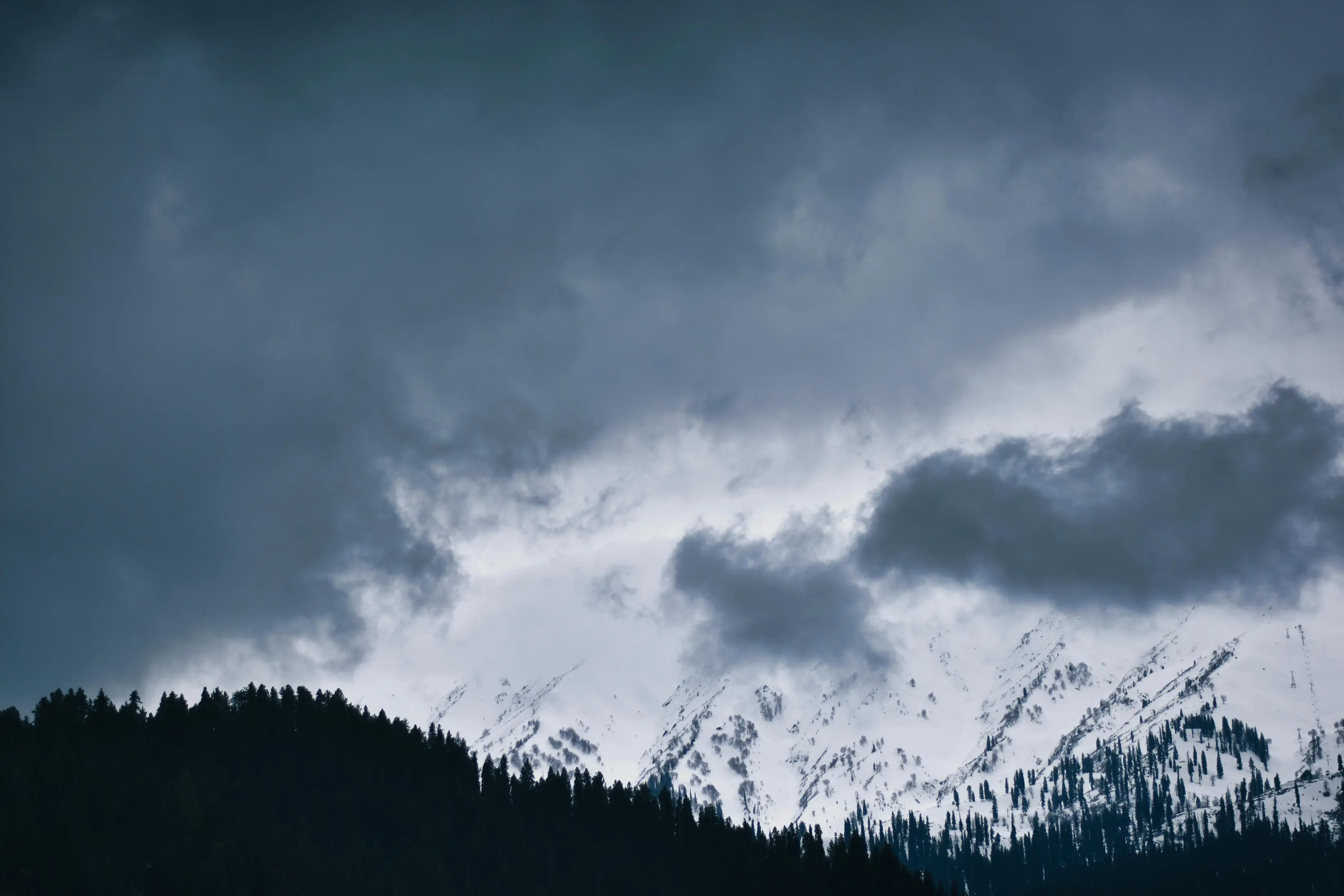 Misty green mountains and valleys in Kashmir during the monsoon season