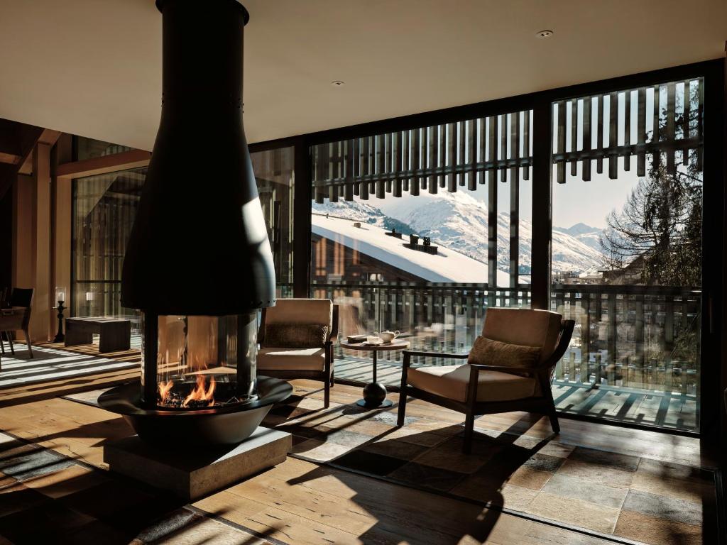 Luxury room with fireplace at The Chedi Andermatt Switzerland