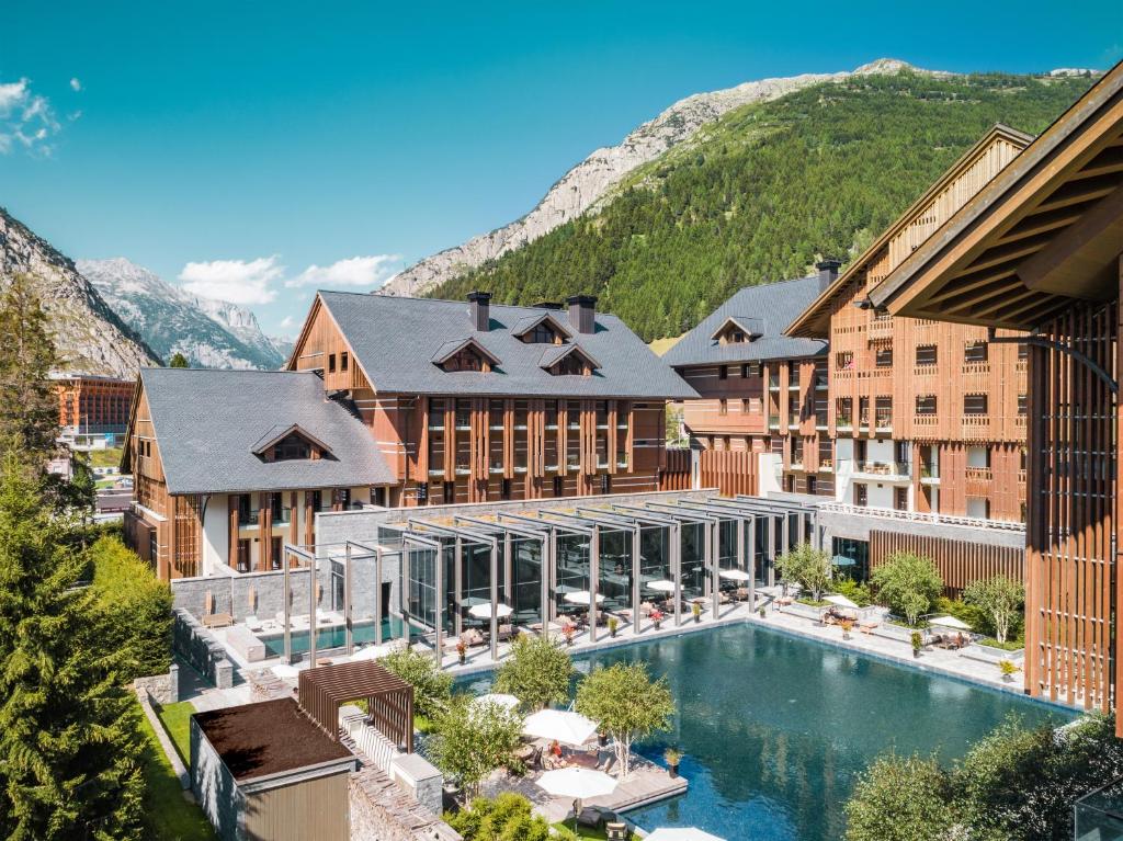 Outdoor swimming pool at The Chedi Andermatt luxury hotel