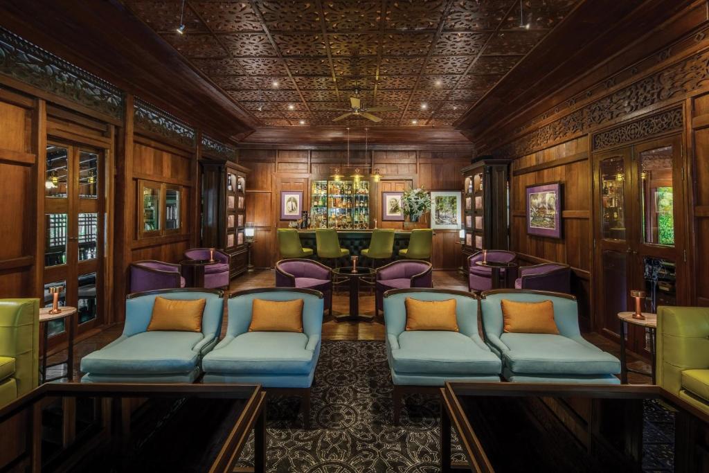 Teak suite interior 137 Pillars House Chiang Mai — colonial heritage LocalHi