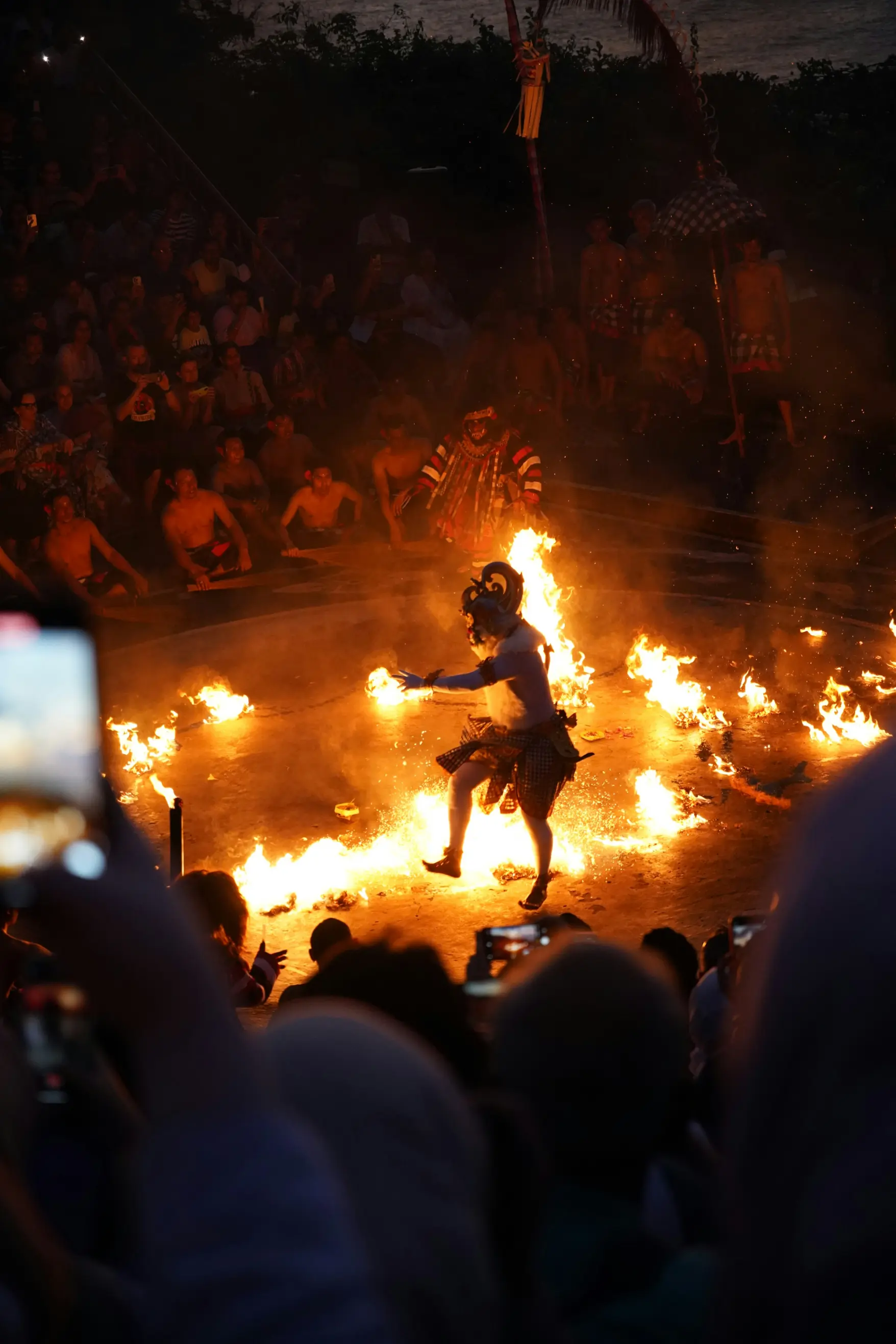 Kecak fire dance performance Uluwatu Temple Bali evening