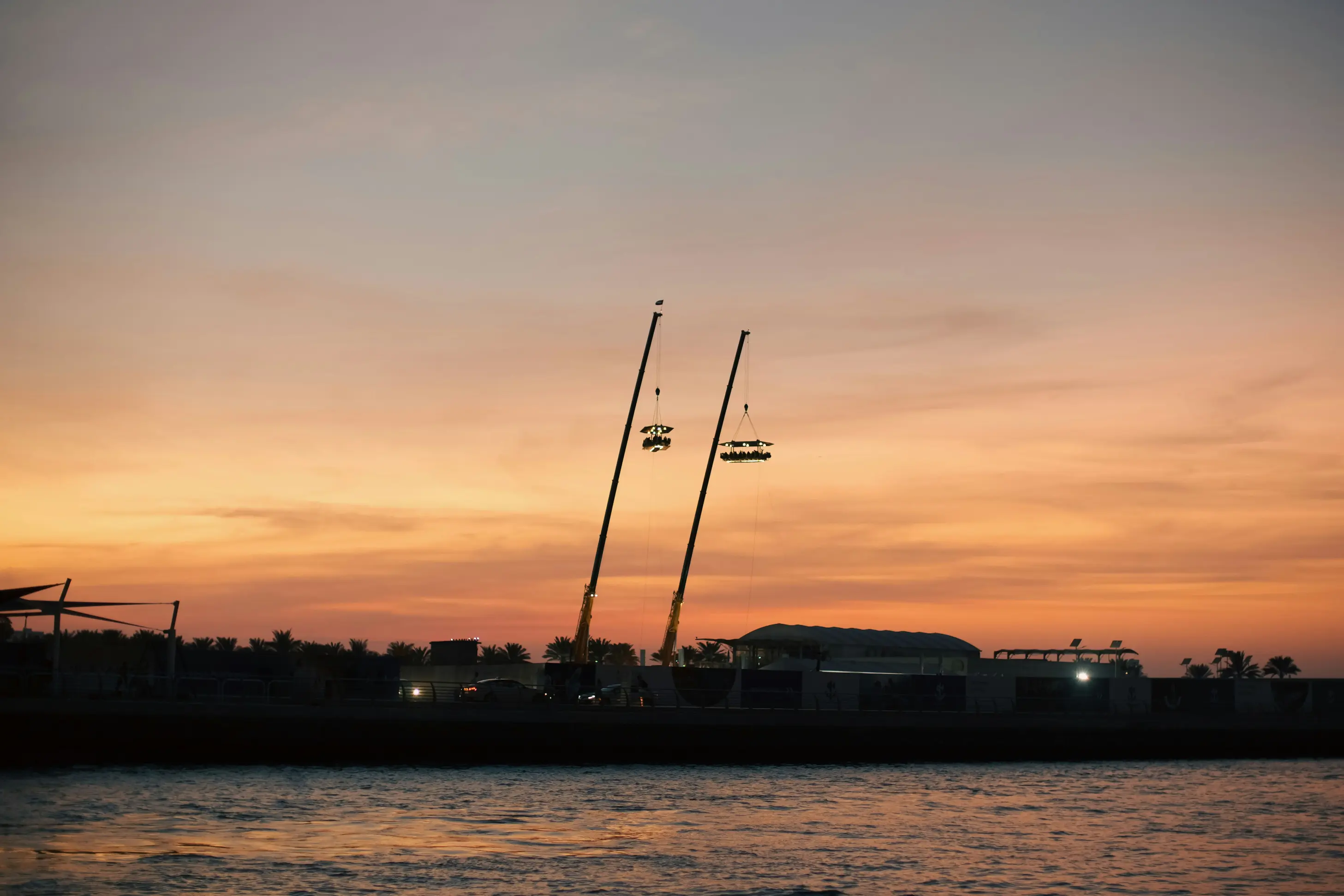 Dinner in the Sky Dubai table suspended above Dubai Marina skyline