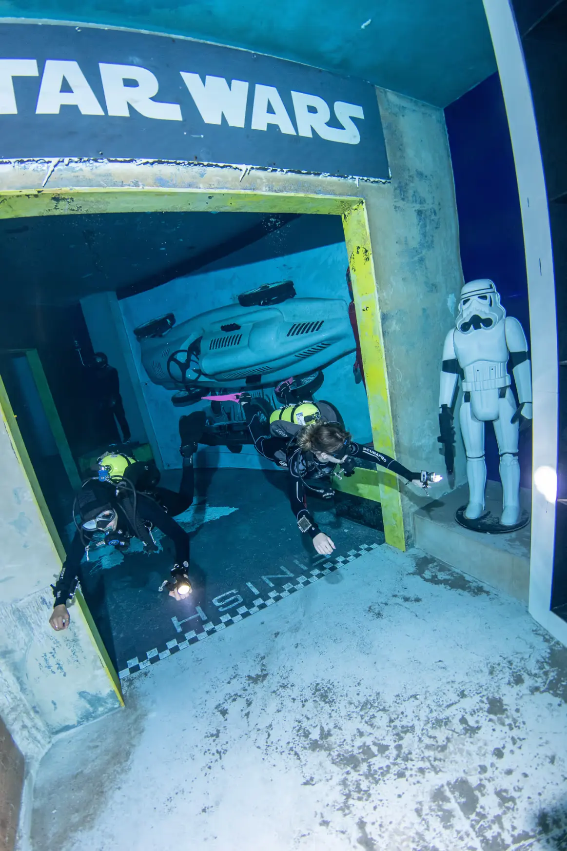 Deep Dive Dubai underwater car and buildings sunken city