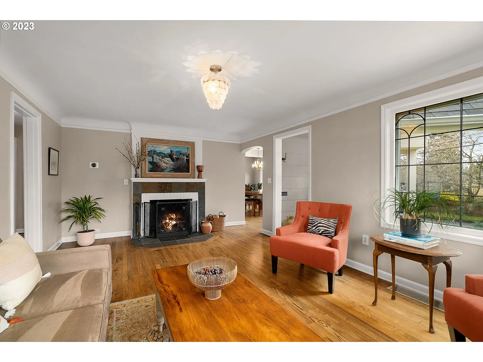 Remodeled living room with updated layout and lighting