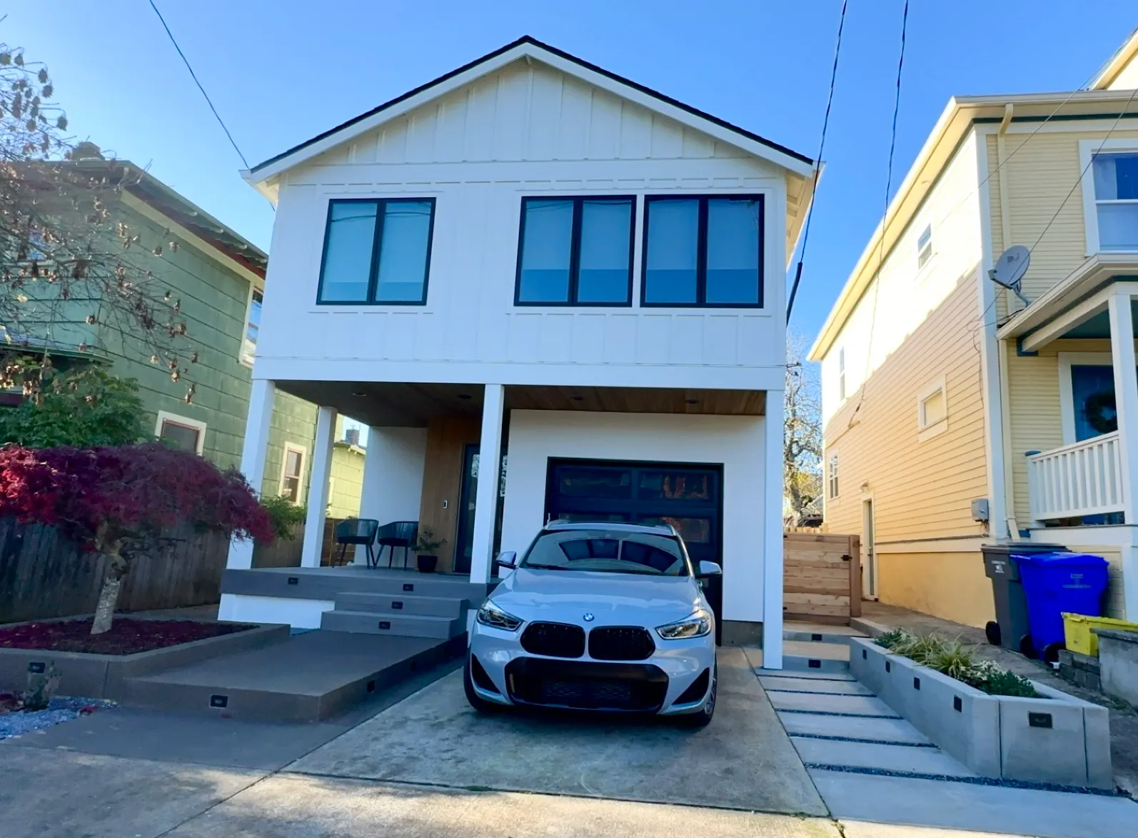 Upgraded home exterior with new facade and landscaping