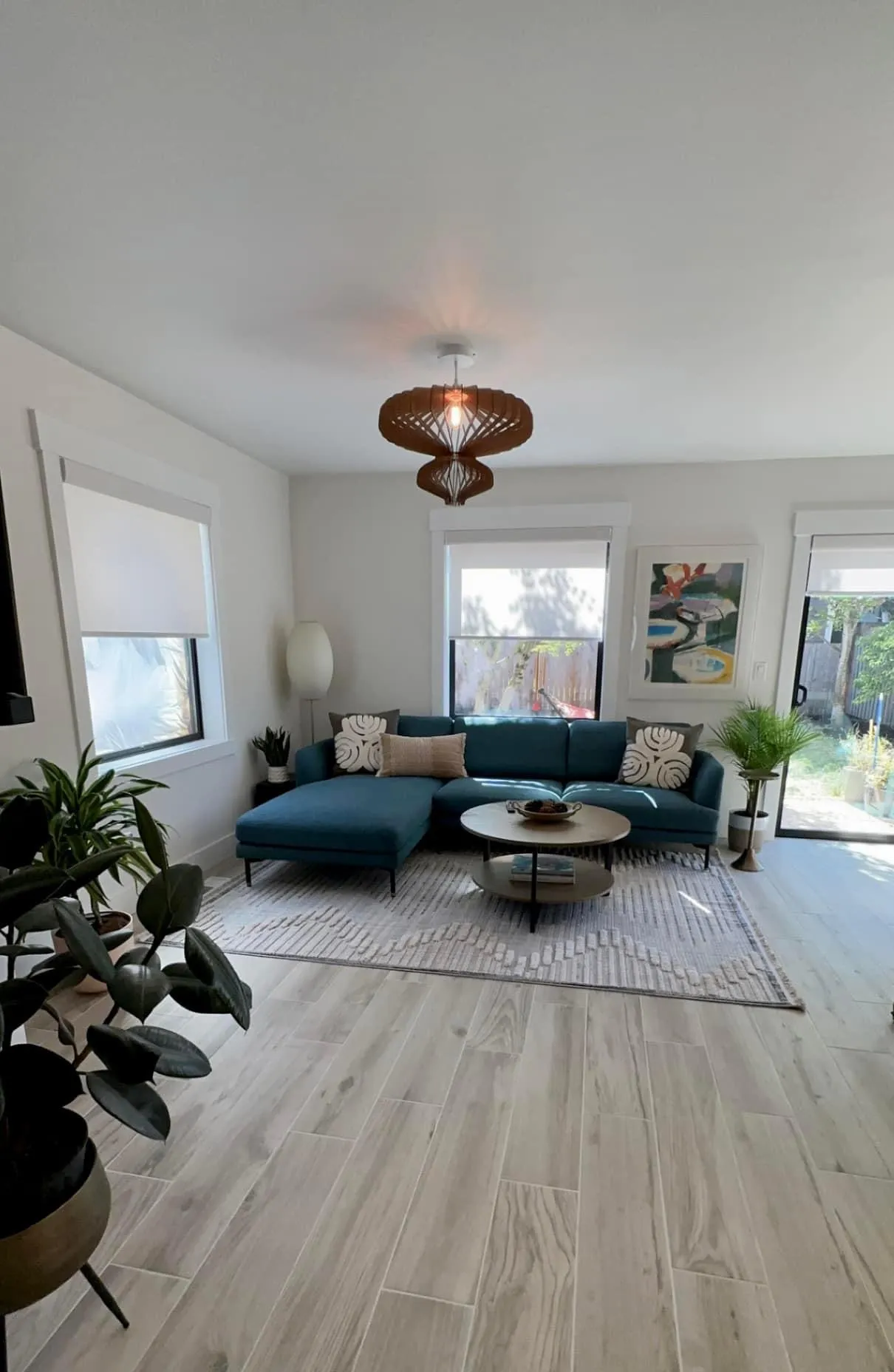 Remodeled living room with updated layout and lighting