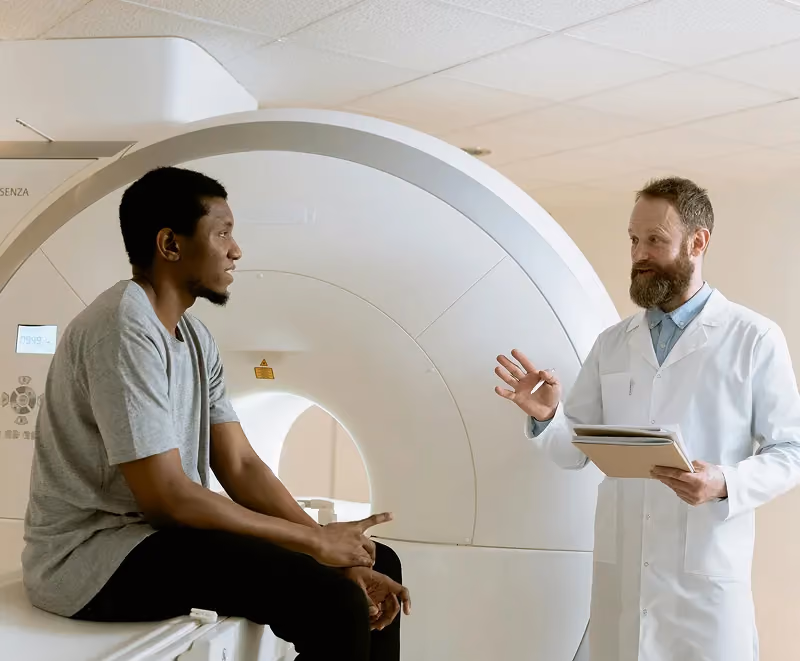 Neurosurgical_care_professionals_discussing_treatment_in_an_MRI_room_Westlake_Village_CA