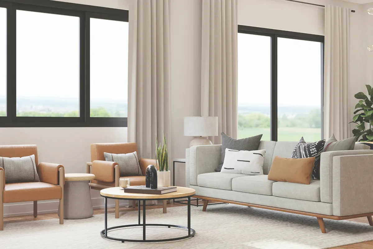 Tan living room with large black windows