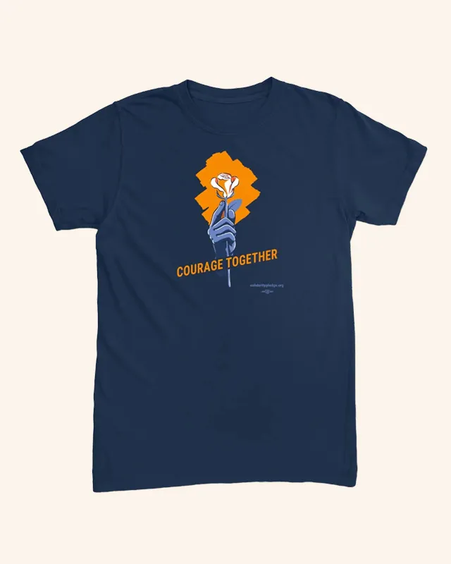 A blue short-sleeved t-shirt with a logo of a hand holding an orange rose and the words "Courage Together"