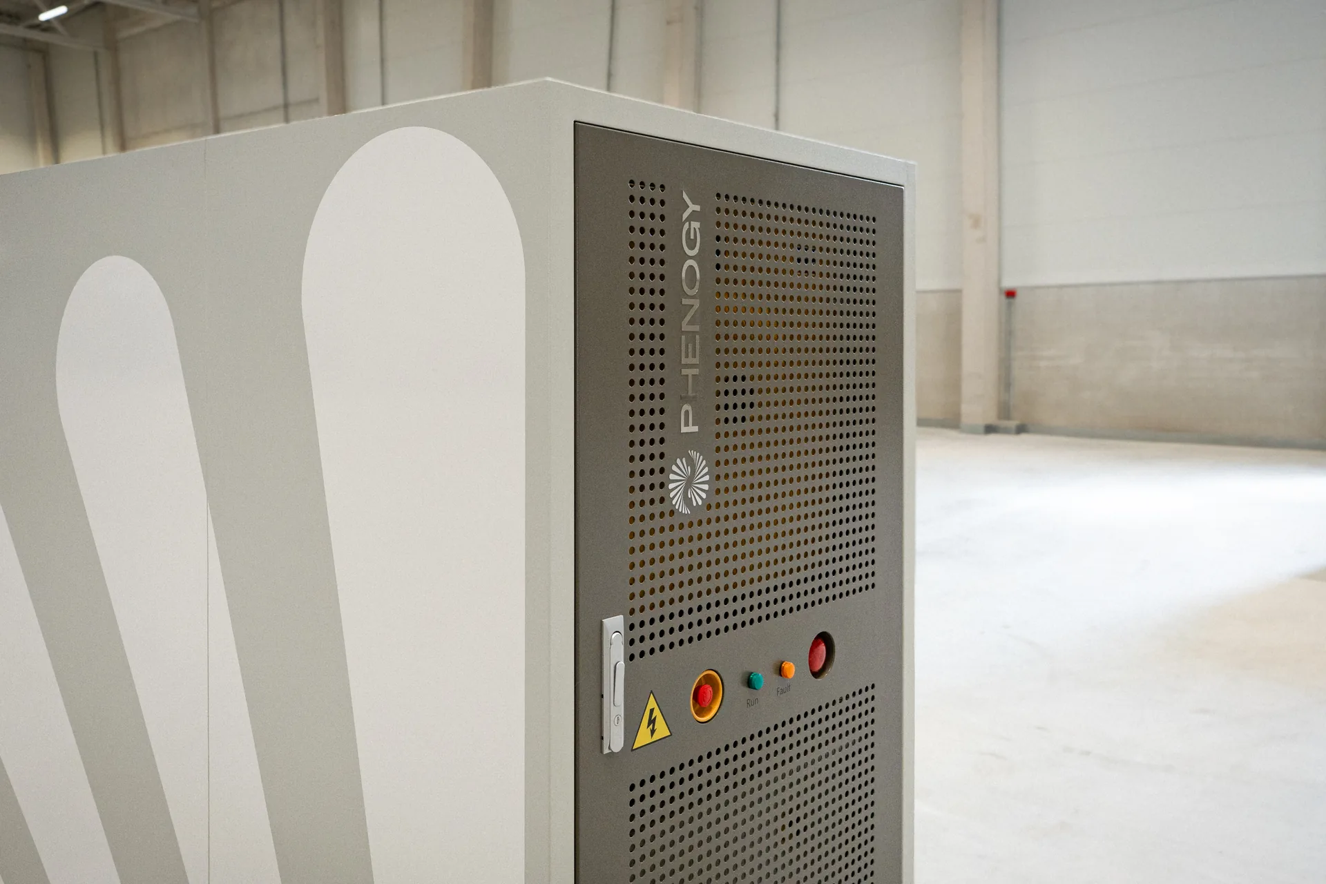 Close-up of a PHENOGY battery cabinet showing the ventilation panel and control buttons