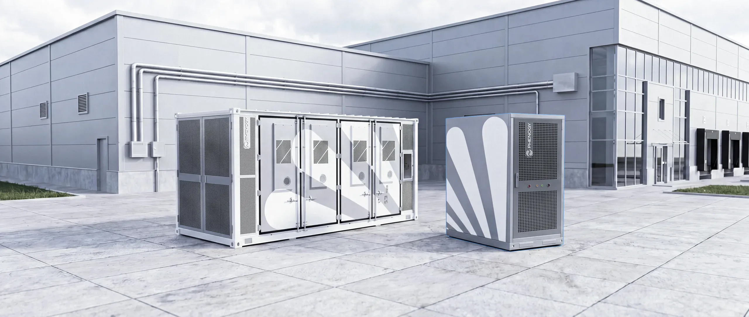 PHENOGY container and cabinet battery storage systems outside an industrial building