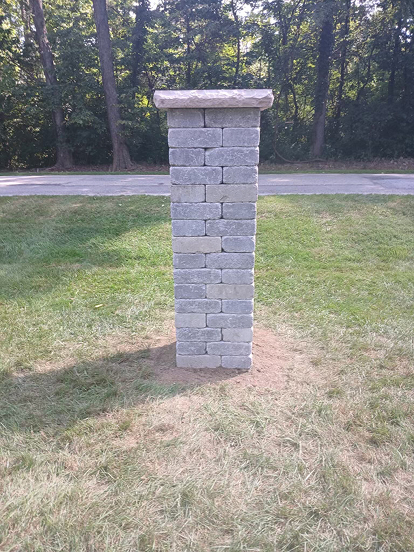 Brick pole in yard
